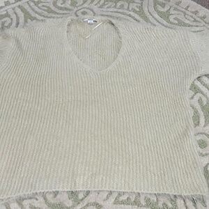 Small Urban Outfitters white oversized fluffy sweater.